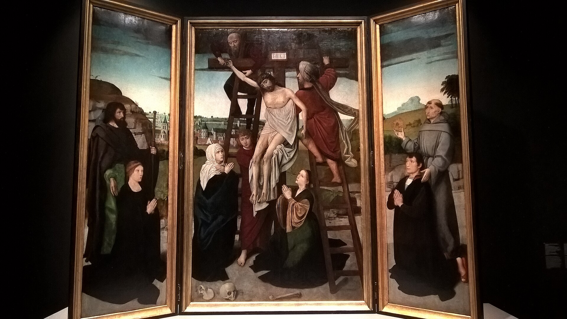 Imagem de referência de Tríptico da Descida da Cruz, descrito nos dados abertos como tríptico de pinturas a óleo sobre madeira atribuído ao artista flamengo Gerard David