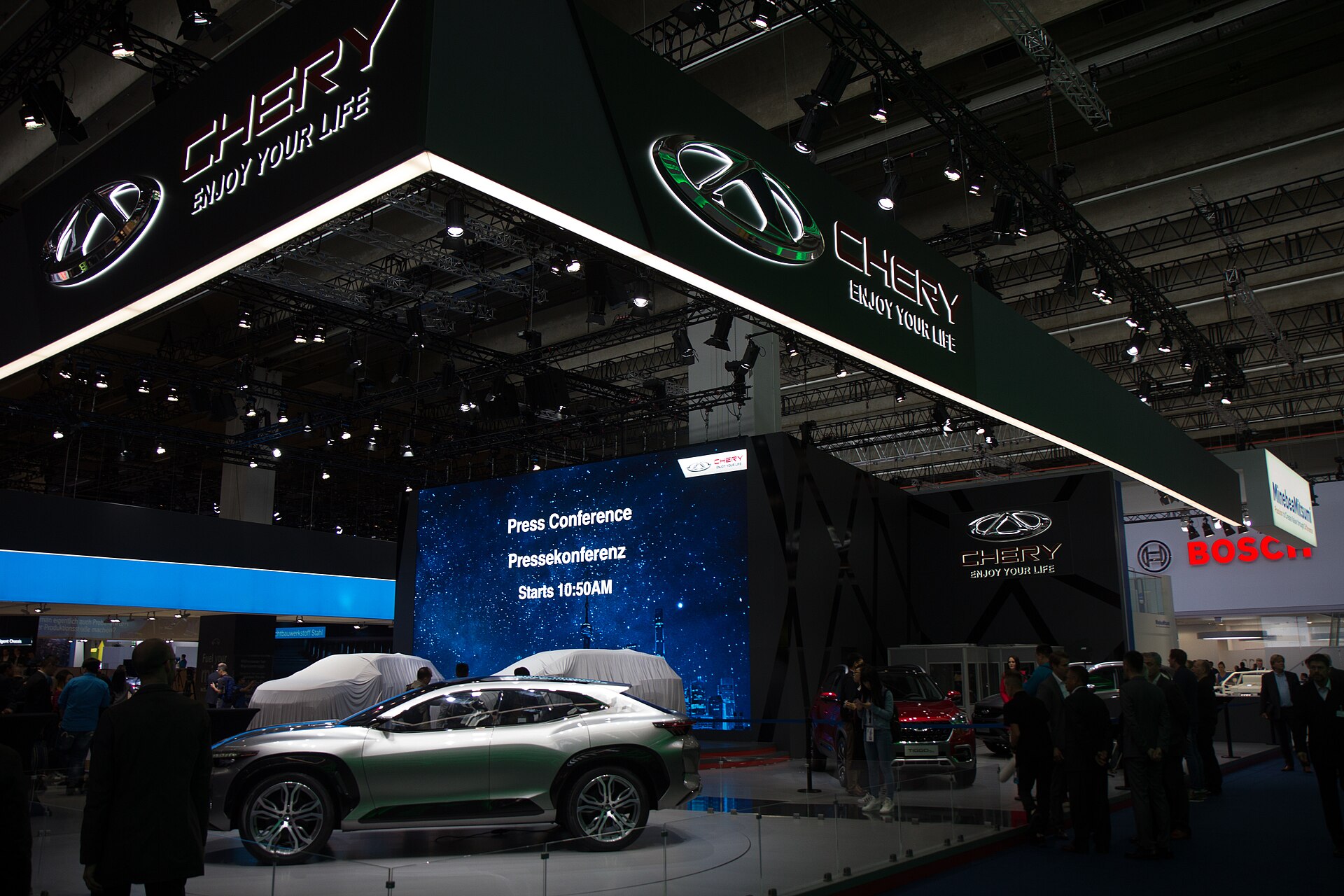 Imagem de referência relacionada a Chery, item descrito como empresa chinesa de fabricação de automóveis